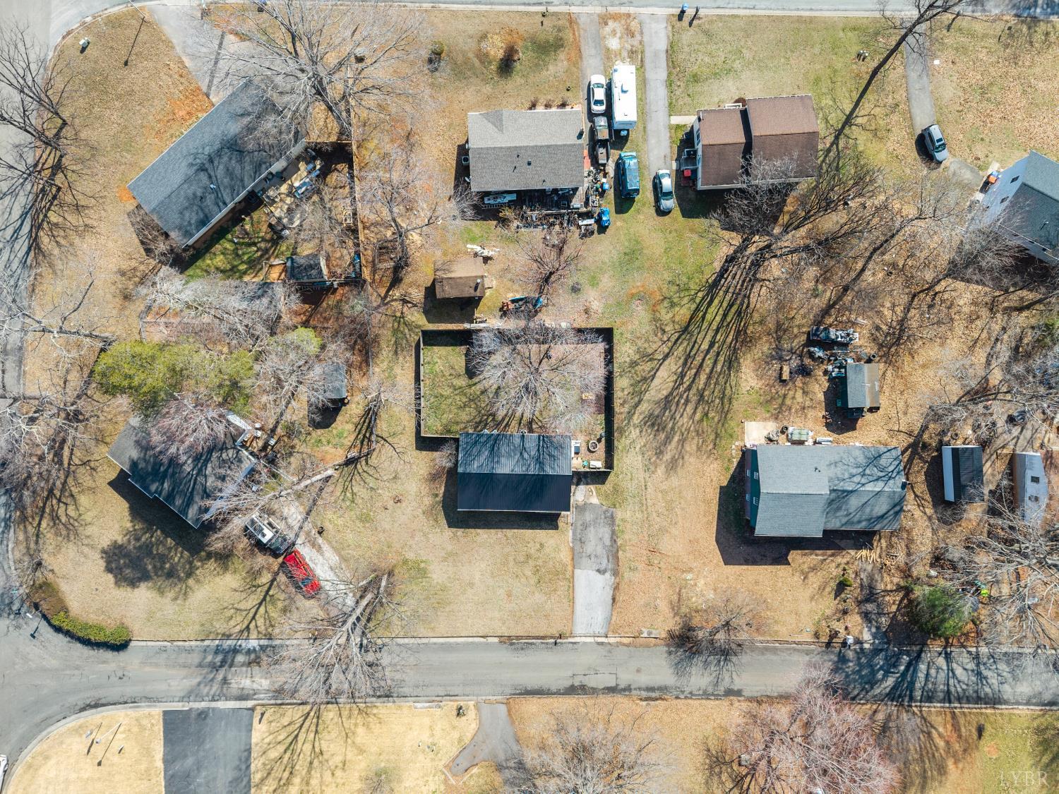 119 Dogwood Street Amherst, VA 24521 - Photo 33 of 37 an aerial view of a house with a yard and large trees