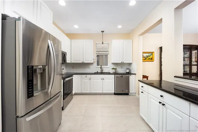 $475,000 | 583 Northwest Cherry Oak Drive, Jensen Beach, FL 34957