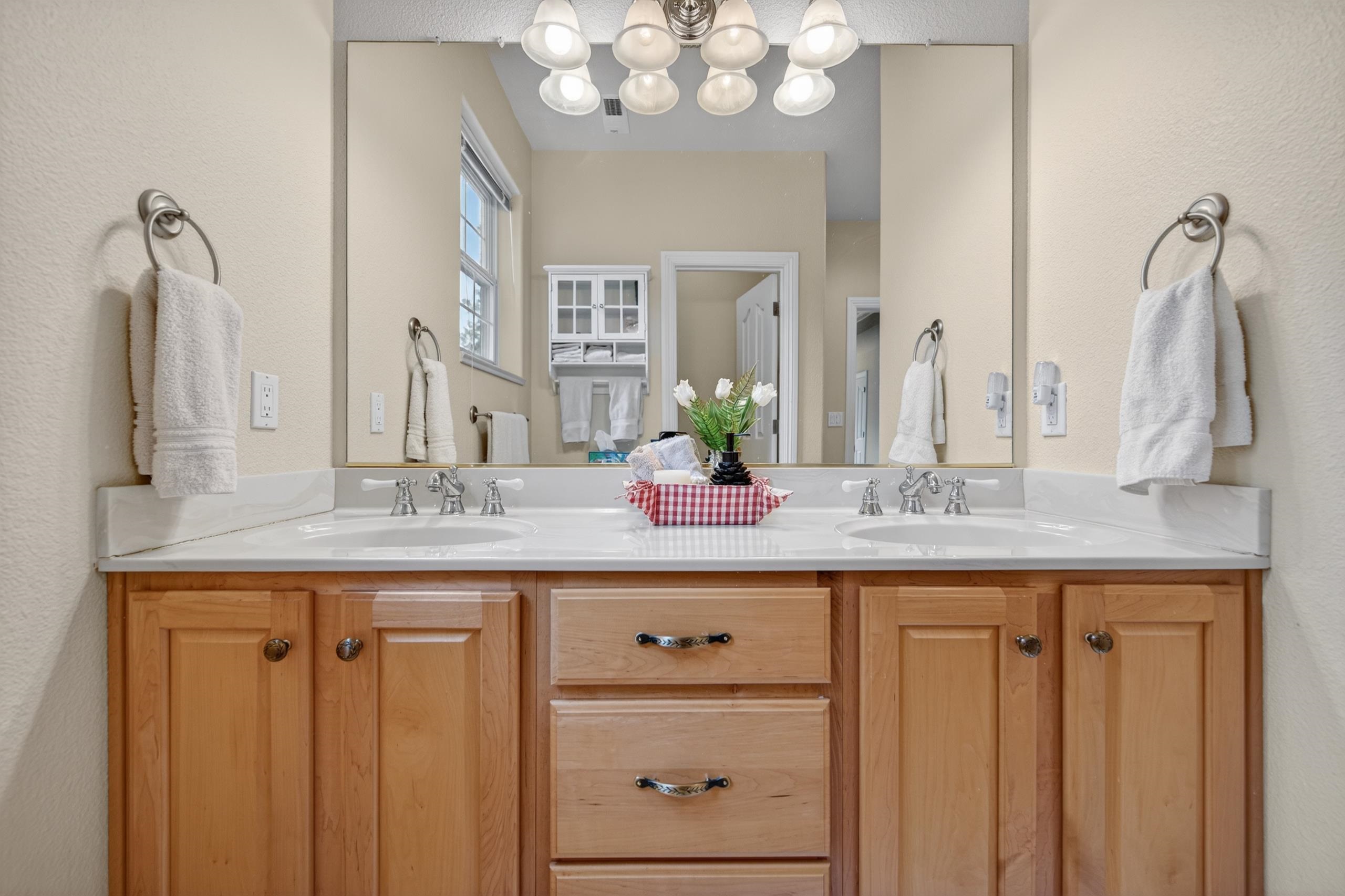 1017 Timber Ridge Road Lake Almanor, CA 96137 - Photo 29 of 45 a bathroom with sink and mirror