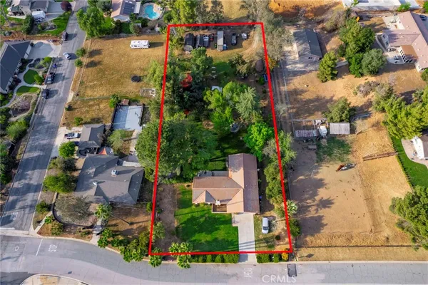 an aerial view of multiple houses with outdoor space