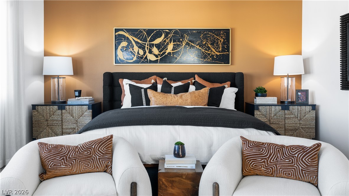 11099 Socrates Ridge Street Las Vegas, NV 89141 - Photo 12 of 29 This tranquil sleeping space offers comfort and style with warm tones.