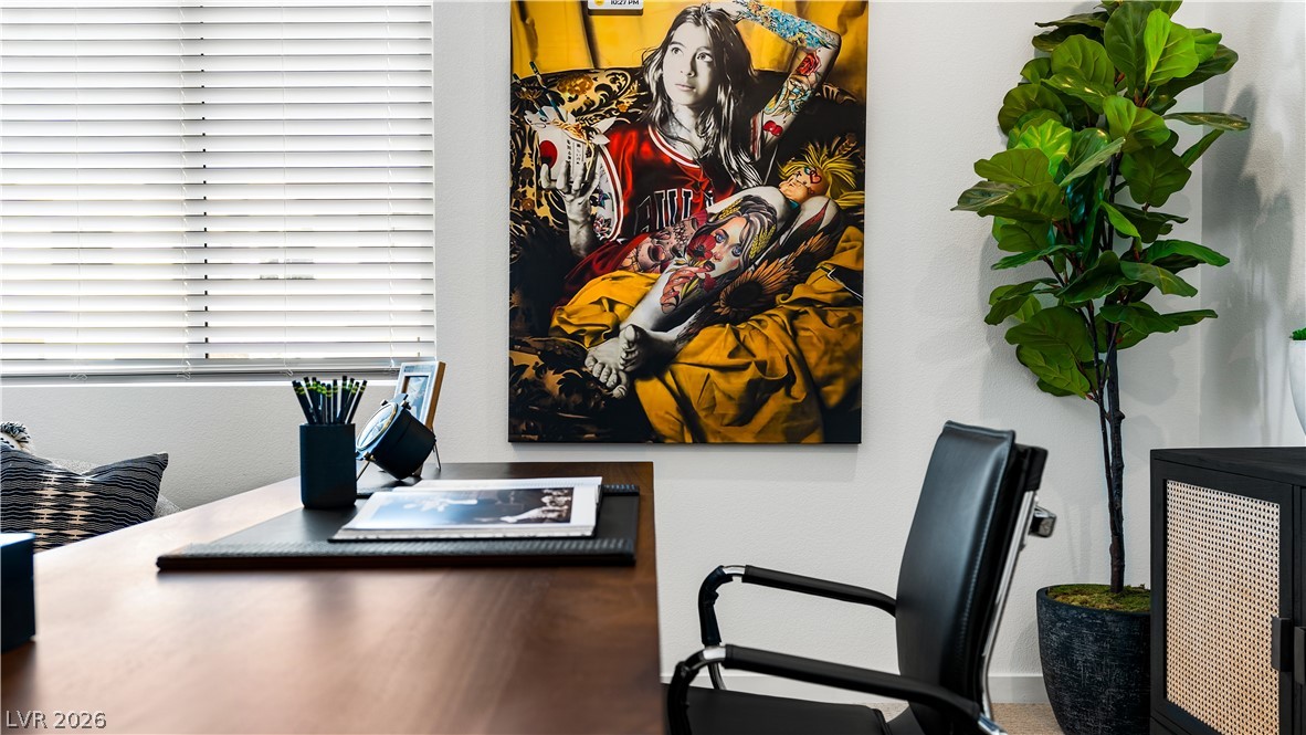 11099 Socrates Ridge Street Las Vegas, NV 89141 - Photo 15 of 29 This dedicated workspace offers a blend of style and productivity.
