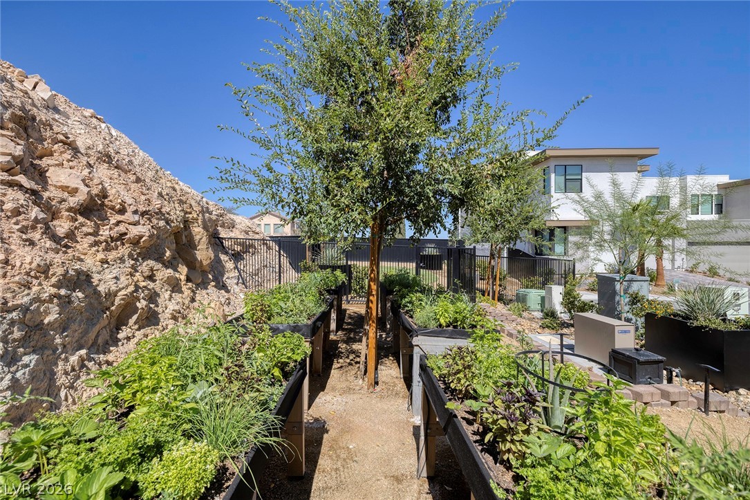 11099 Socrates Ridge Street Las Vegas, NV 89141 - Photo 28 of 29 This outdoor space features raised garden beds, perfect for cultivating fresh herbs and vegetables.