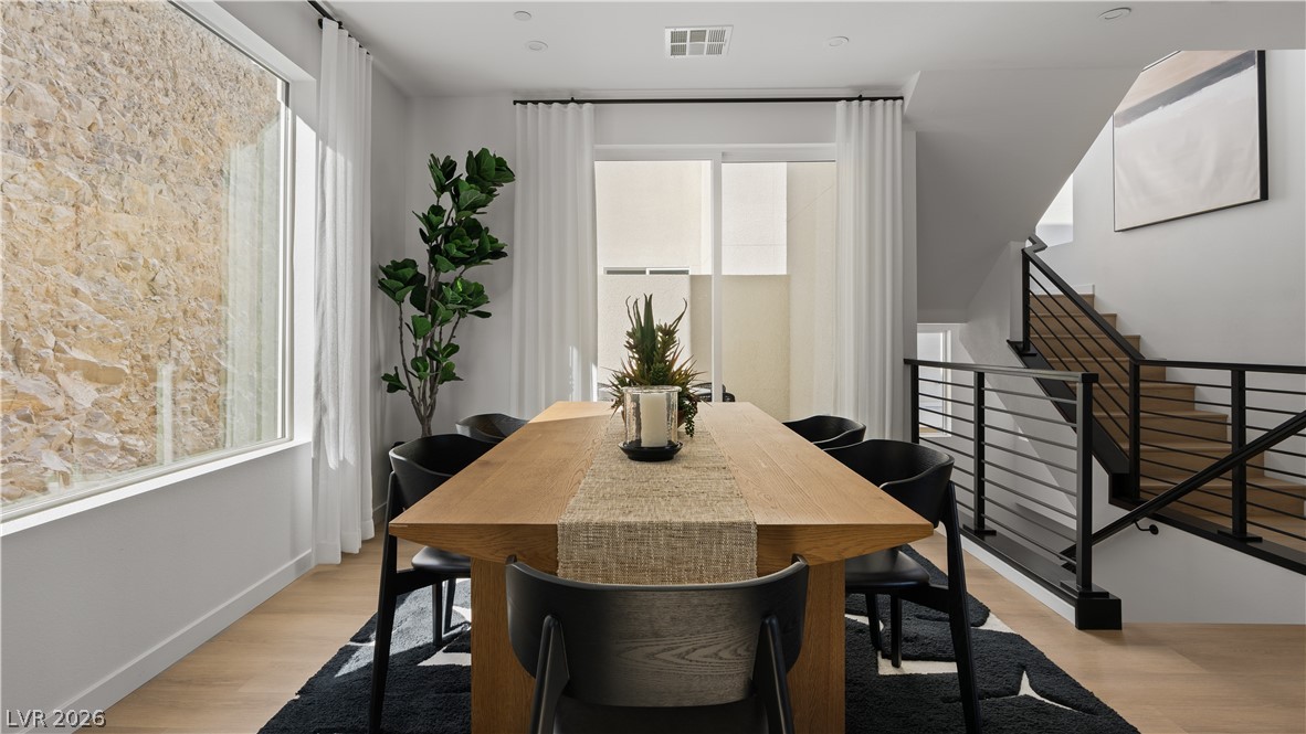 11099 Socrates Ridge Street Las Vegas, NV 89141 - Photo 9 of 29 This bright and airy dining room offers abundant natural light and seamless flow.