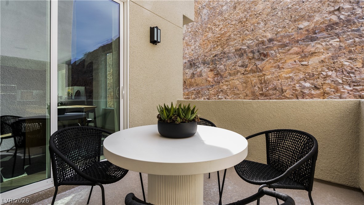 11099 Socrates Ridge Street Las Vegas, NV 89141 - Photo 10 of 29 This private patio offers an ideal space for outdoor relaxation.