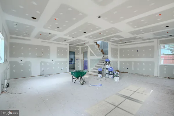 a swimming pool view with a outdoor seating