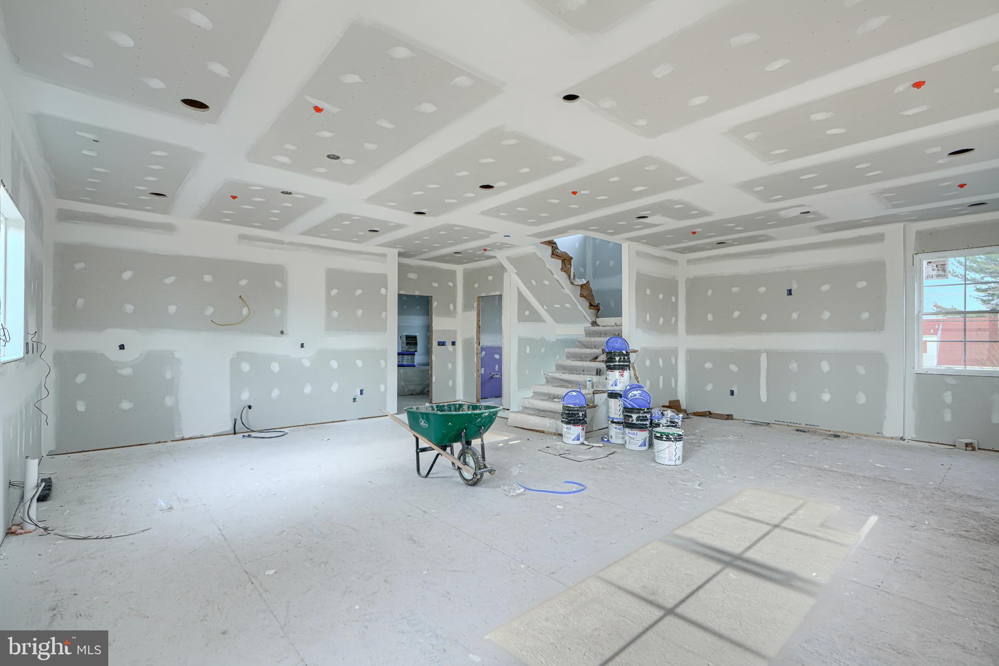 918 Sue Grove Road Essex, MD 21221 - Photo 16 of 19 a living room with furniture and a chandelier