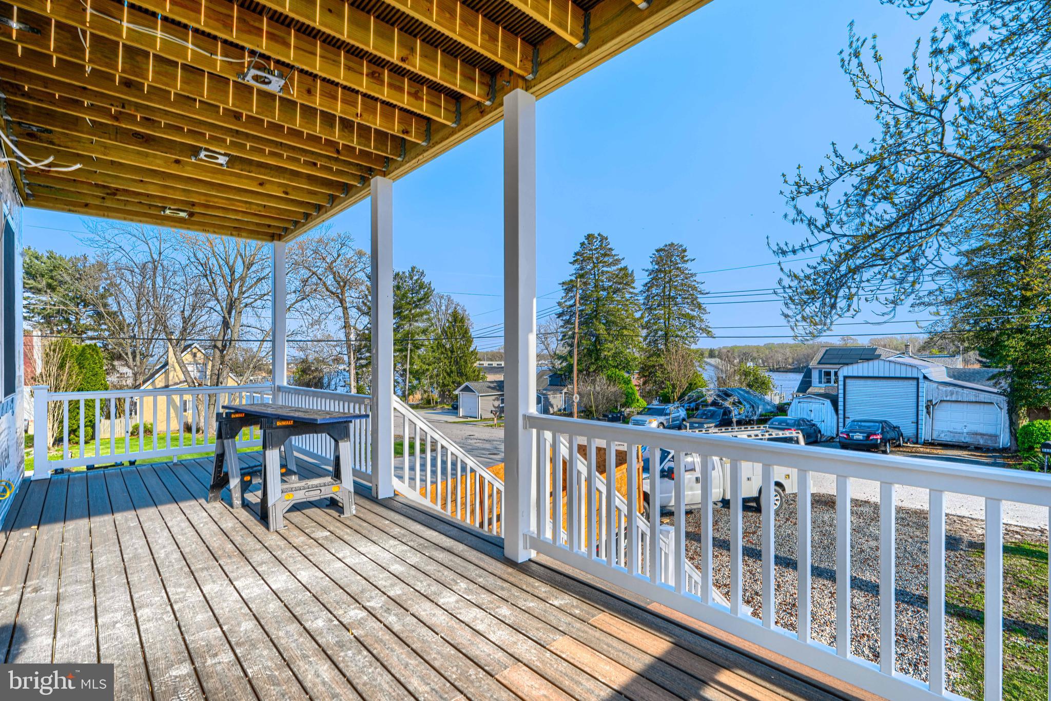 918 Sue Grove Road Essex, MD 21221 - Photo 17 of 19 a view of a deck with wooden floor and outdoor seating