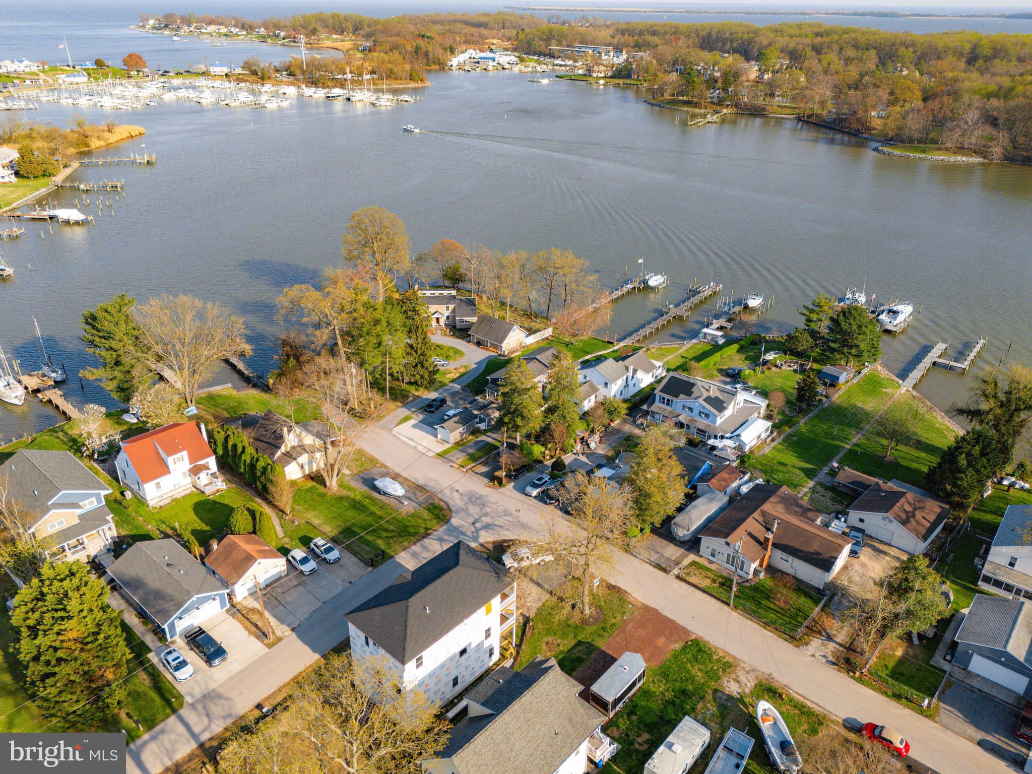 918 Sue Grove Road Essex, MD 21221 - Photo 7 of 19 an aerial view of a house with a lake view