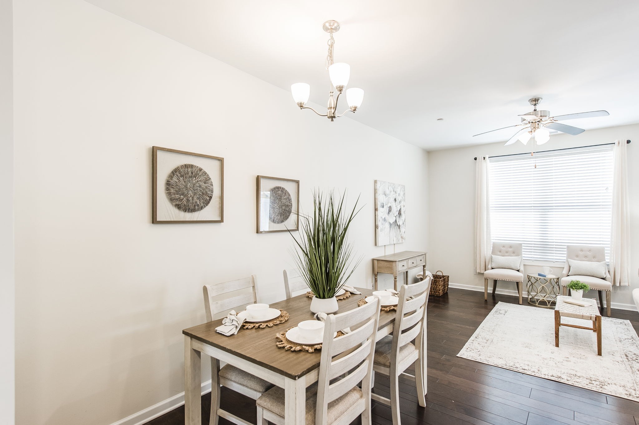 342 Manor Row Pleasant View, TN 37146 - Photo 16 of 45 a view of a dining room with furniture window and wooden floor