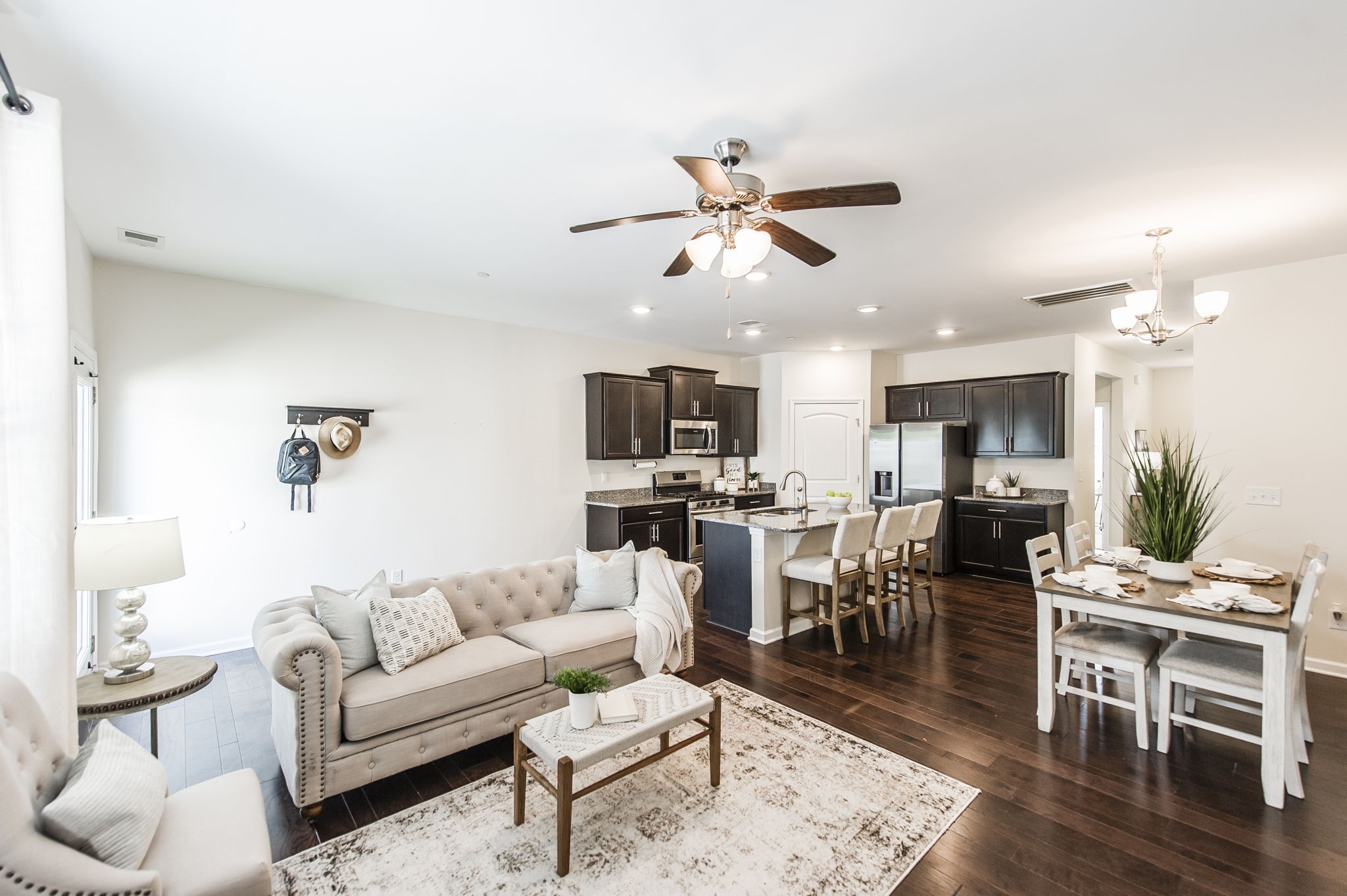 342 Manor Row Pleasant View, TN 37146 - Photo 21 of 45 a living room with furniture kitchen view and a window