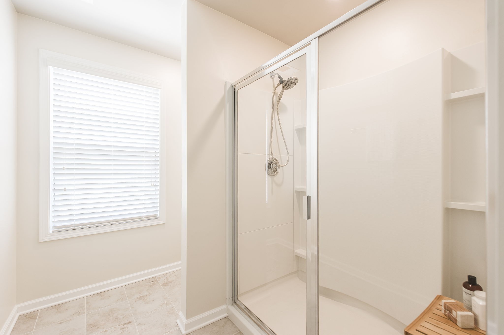 342 Manor Row Pleasant View, TN 37146 - Photo 32 of 45 a bathroom with a shower and a sink