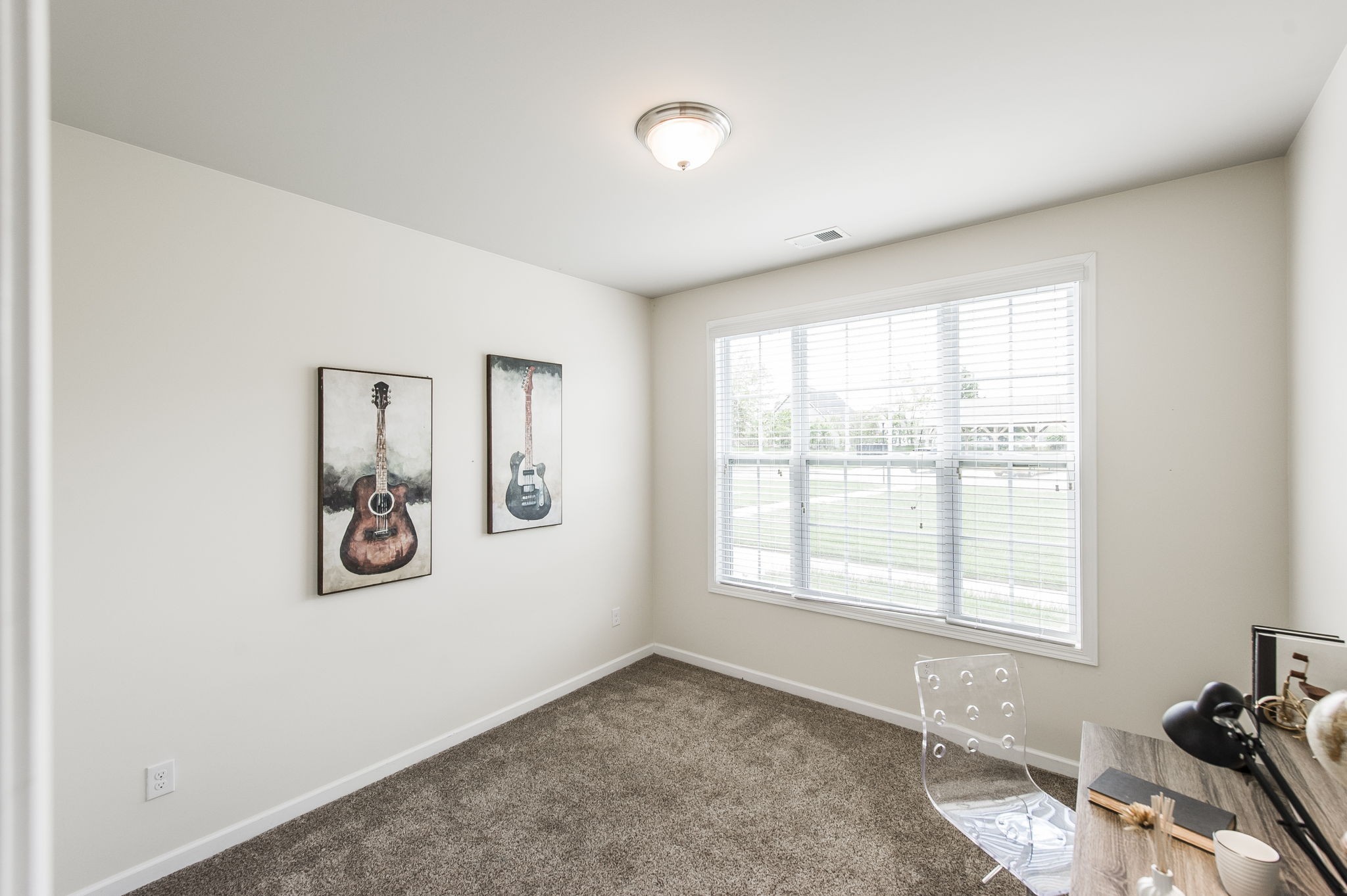 342 Manor Row Pleasant View, TN 37146 - Photo 7 of 45 a view of a room with window and lounge chair