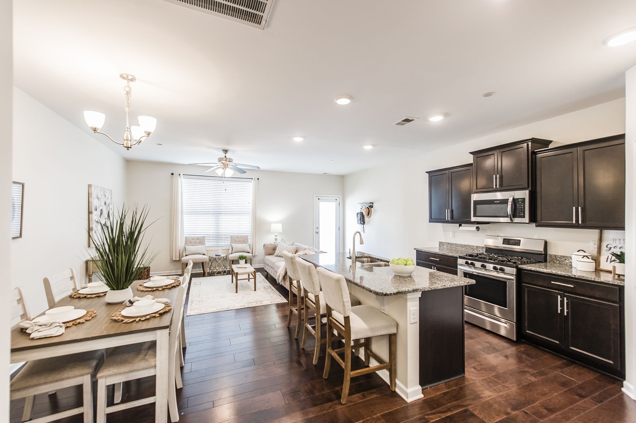 342 Manor Row Pleasant View, TN 37146 - Photo 10 of 45 a large kitchen with a table and chairs