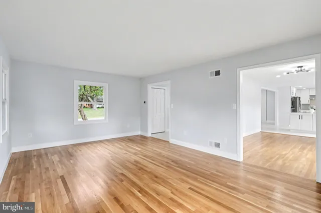 a view of an empty room and window