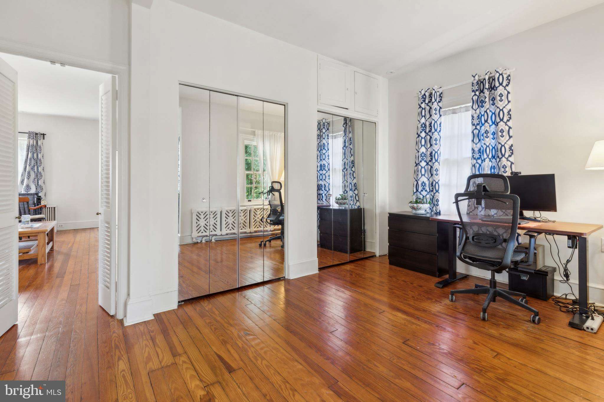 15 West Hampton Road Philadelphia, PA 19118 - Photo 8 of 25 a view of a workspace with wooden floor and a window