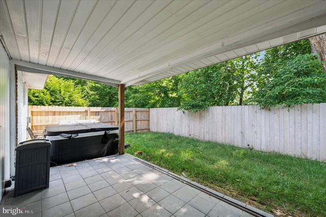 a view of backyard with tub and sink