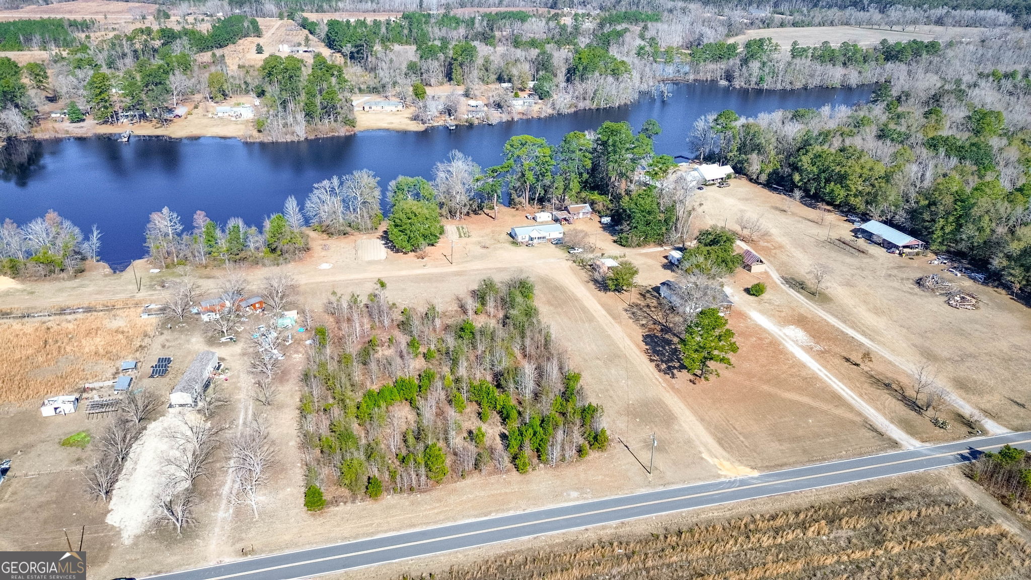 0 Clark Road Guyton, GA 31312 - Photo 6 of 12 a view of a lake from a balcony