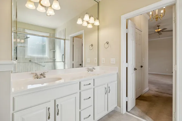 an empty room with a empty space and windows