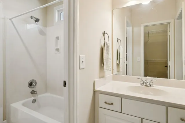 a view of a house with wooden deck