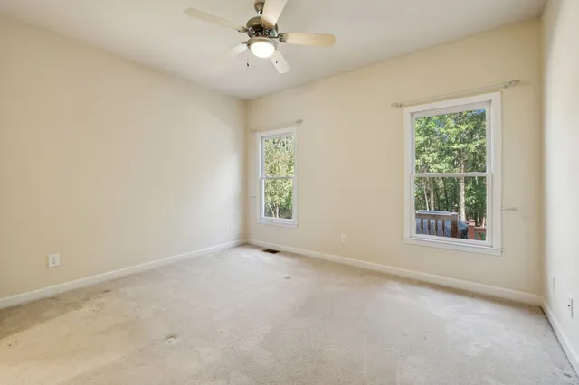 a view of deck with a chair and swing