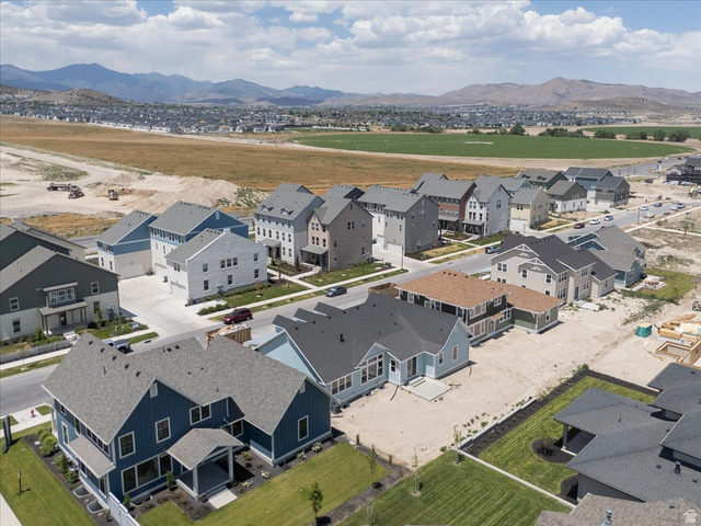 952 Mathilda Drive, Unit 156 Saratoga Springs, UT 84045 - Photo 5 of 25 Newly constructed neighborhood featuring diverse architectural styles, visible against a backdrop of distant mountains