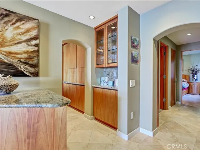 a bathroom with a sink mirror and a bathtub