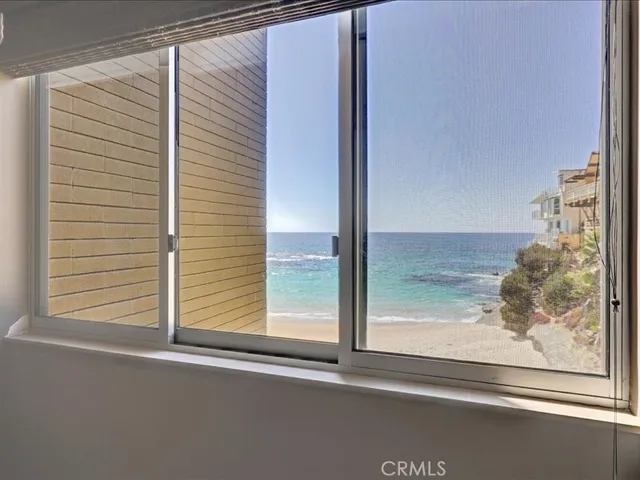 a bathroom with a shower and a curtain