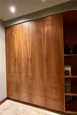 a bathroom with a double vanity sink mirror and shower