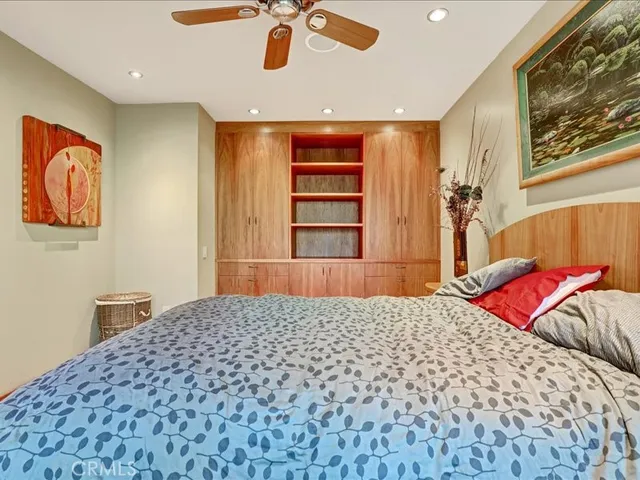 a bathroom with a shower and a sink