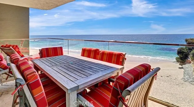 a outdoor space with a large window and furniture