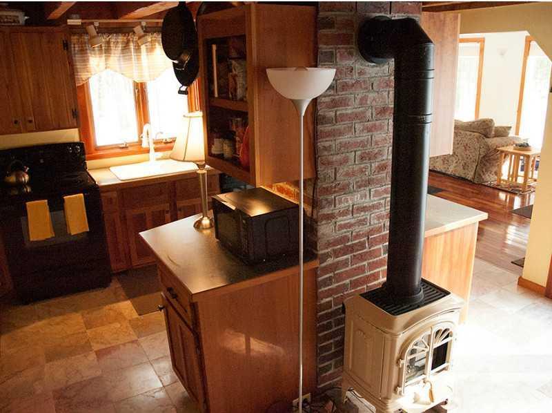 565 Blackstrap Road Falmouth, ME 04105 - Photo 9 of 25 Kitchen. Kitchen island with gas...