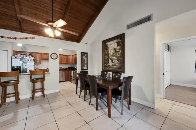 a view of a dining room with furniture