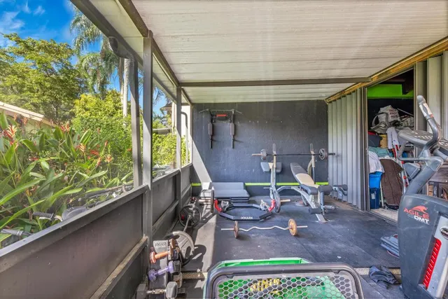 a view of a room with gym equipment