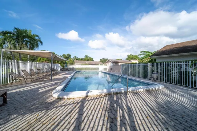 a view of a balcony with wooden floor