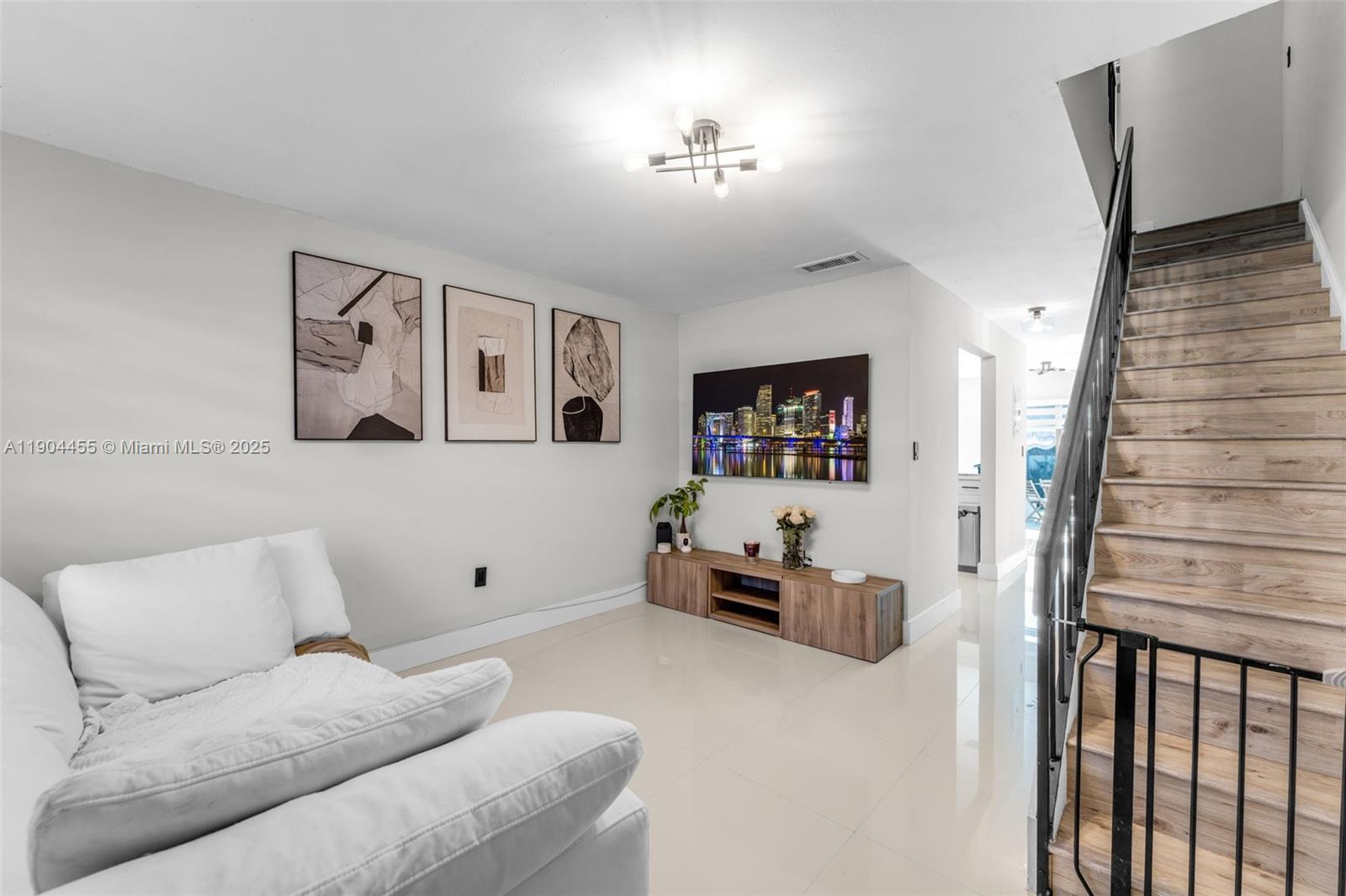 13350 Southwest 58th Terrace, Unit 38 Miami, FL 33183 - Photo 2 of 8 a living room with furniture