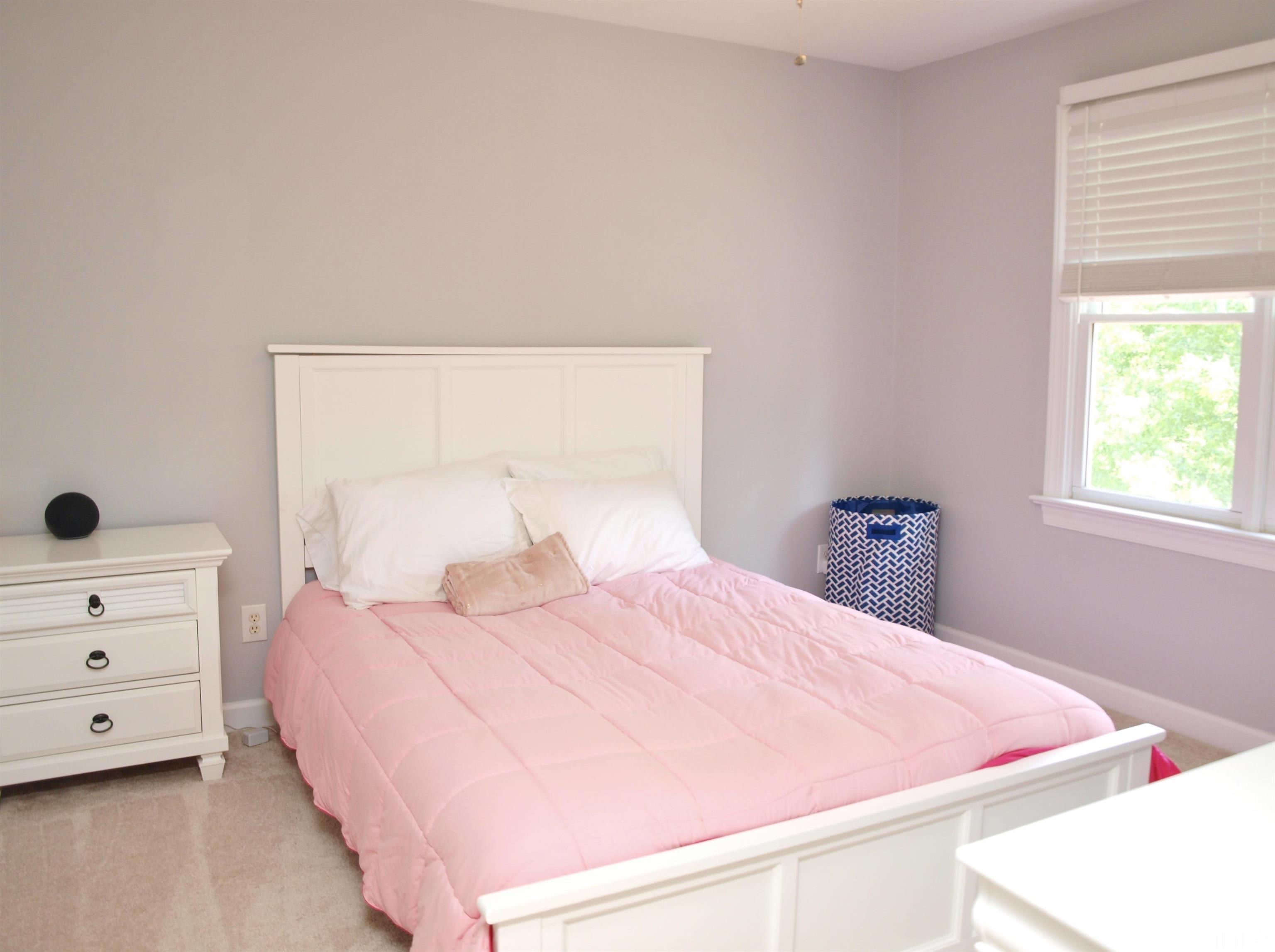2223 Cloud Cover Lane Raleigh, NC 27614 - Photo 14 of 26 a bedroom with a bed and a closet