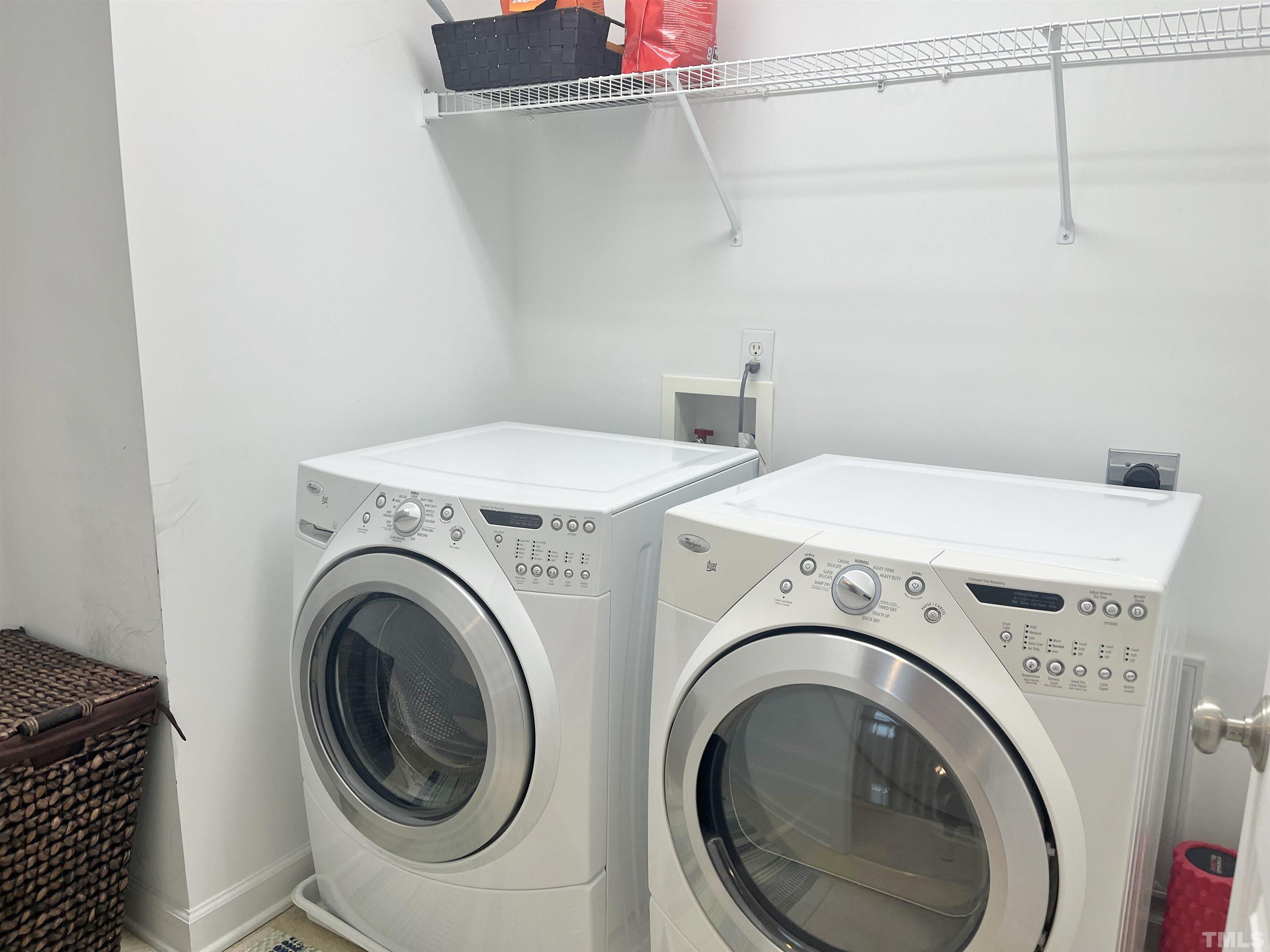 2223 Cloud Cover Lane Raleigh, NC 27614 - Photo 18 of 26 a utility room with dryer and washer