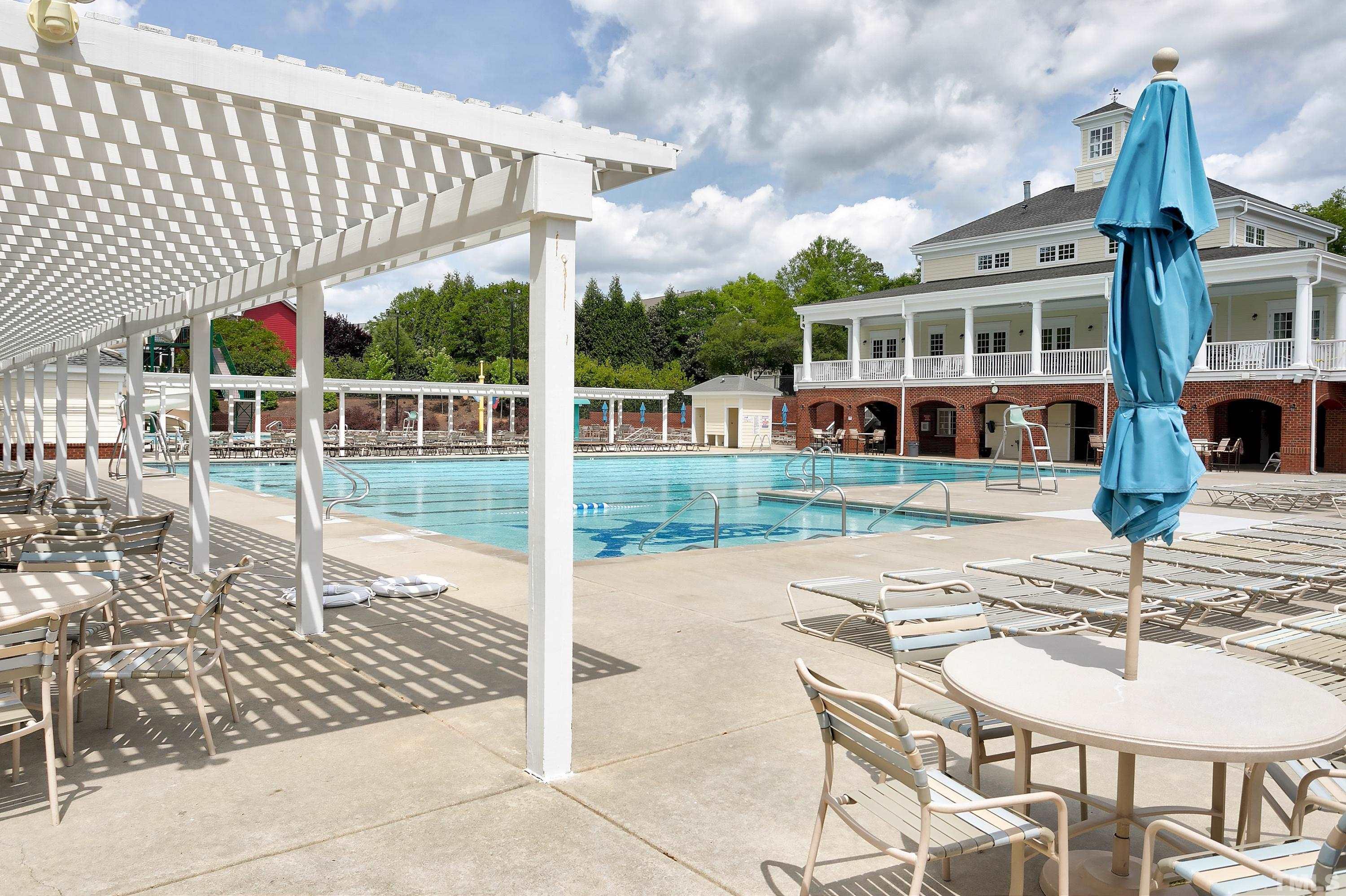 2223 Cloud Cover Lane Raleigh, NC 27614 - Photo 24 of 26 a patio with table and chairs