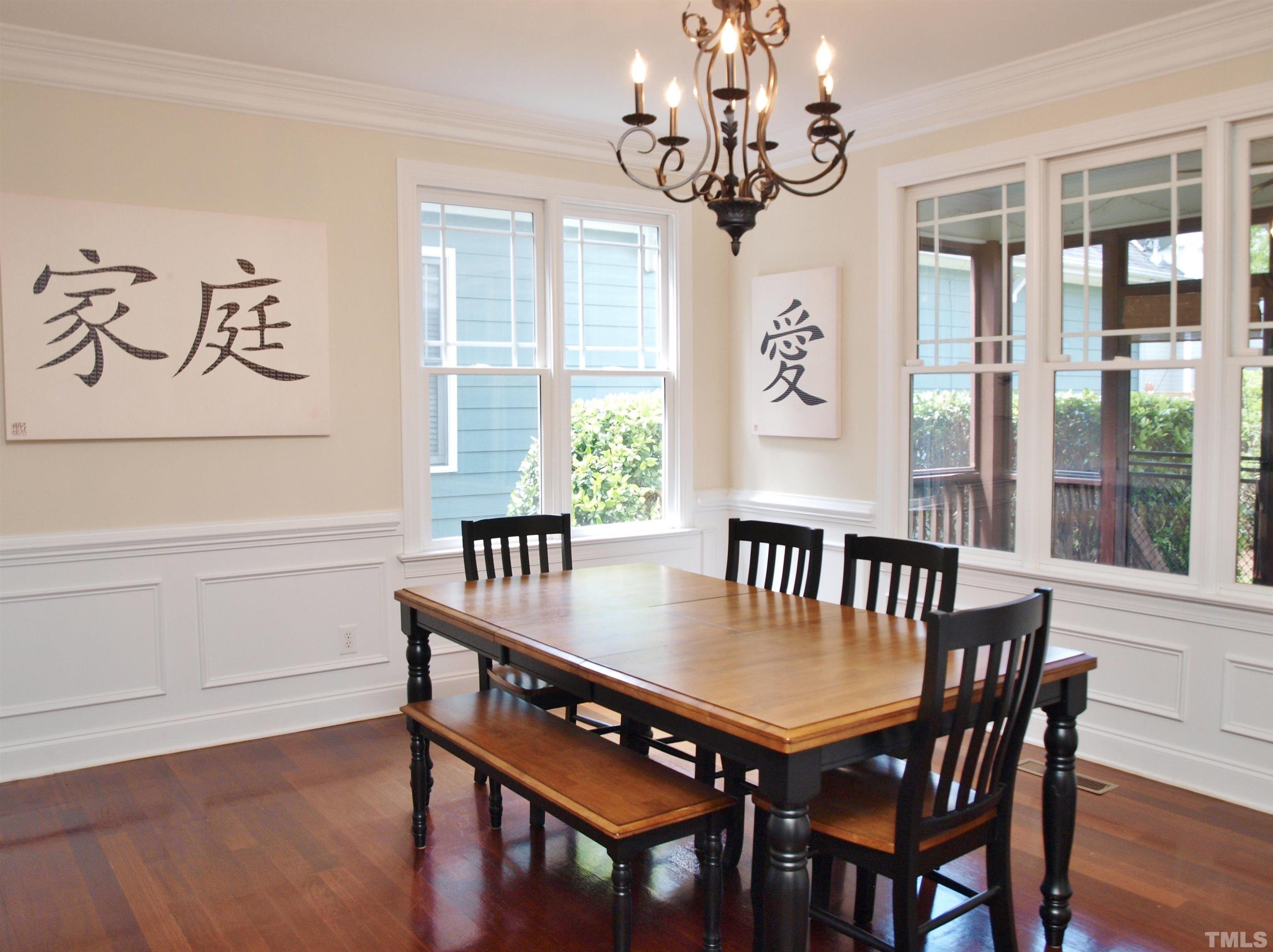 2223 Cloud Cover Lane Raleigh, NC 27614 - Photo 8 of 26 a view of a dining room with furniture window and wooden floor