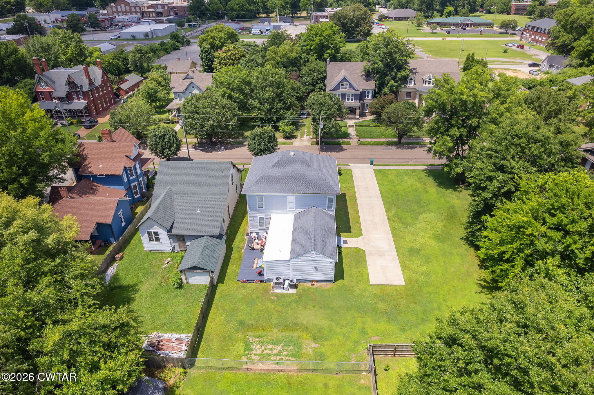 554 East Main Street Jackson, TN 38301 - Photo 57 of 60 an aerial view of residential houses with outdoor space and swimming pool