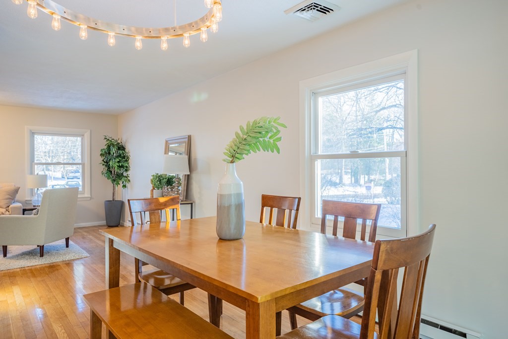 3 Elena Road Lexington, MA 02421 - Photo 10 of 42 a view of a dining room with furniture window and outside view