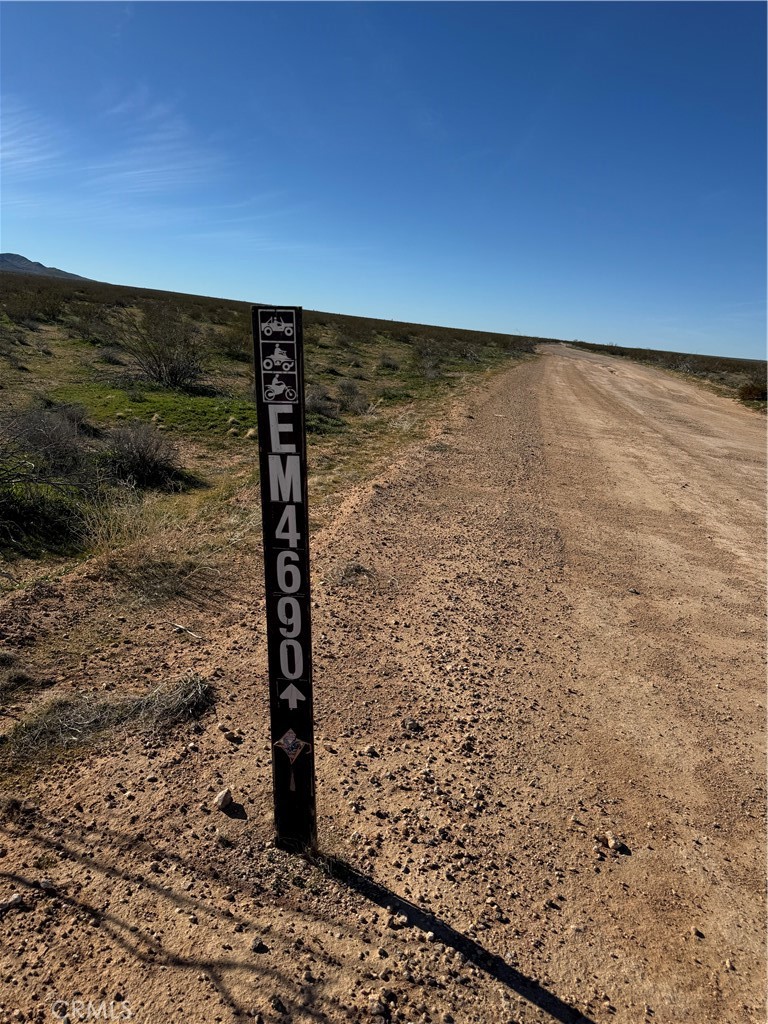 111 Buckthorne Canyon Road Adelanto, CA 92301 - Photo 2 of 6 a view of a road with an ocean view