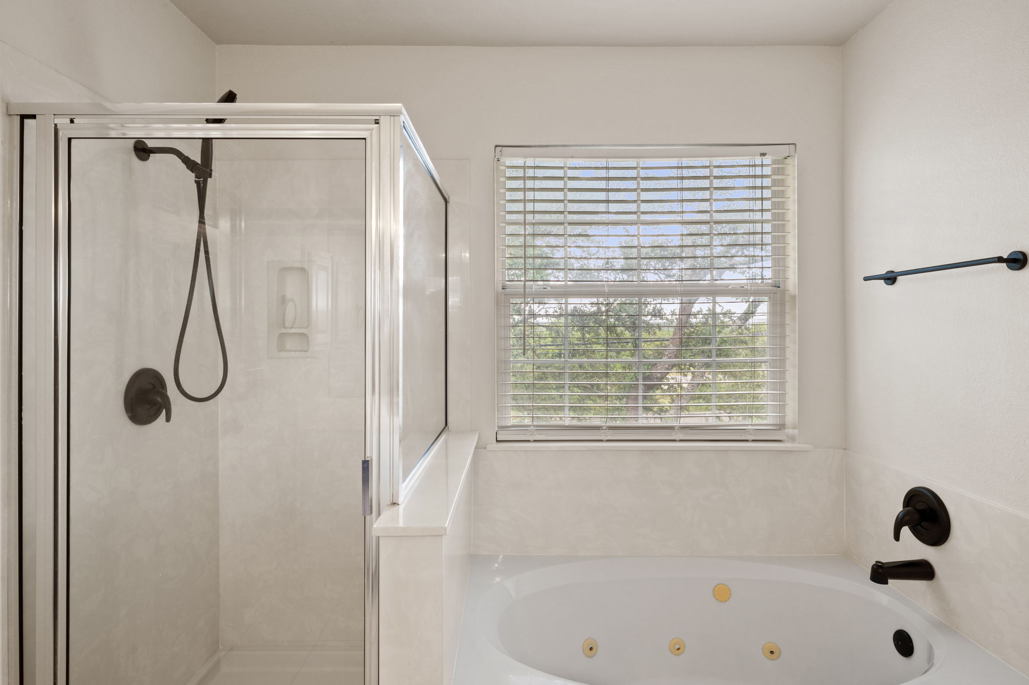 2732 Cascade Falls Drive Austin, TX 78738 - Photo 36 of 40 a bathroom with a bath tub with a shower
