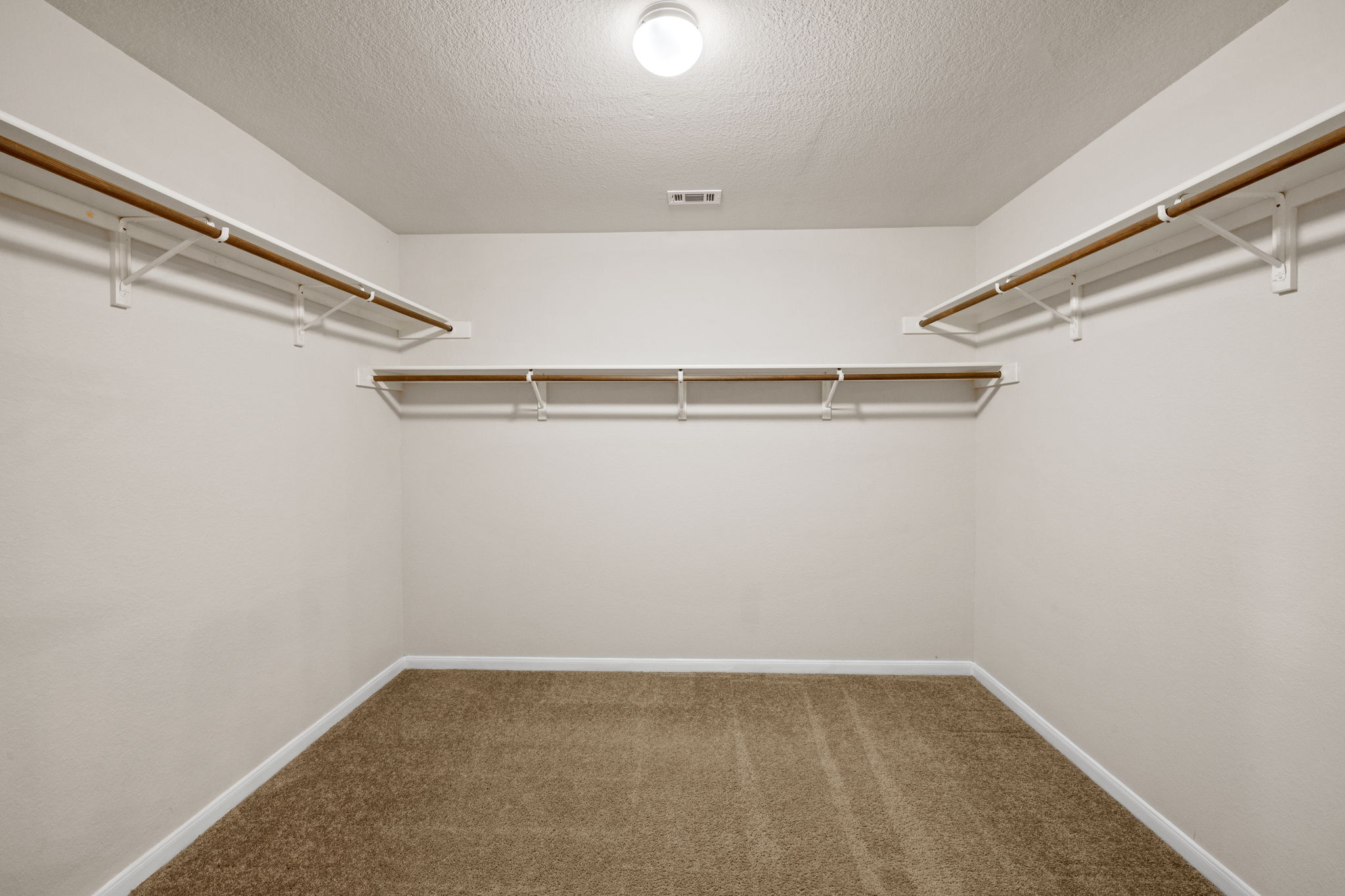 2732 Cascade Falls Drive Austin, TX 78738 - Photo 37 of 40 a view of an empty walk in closet