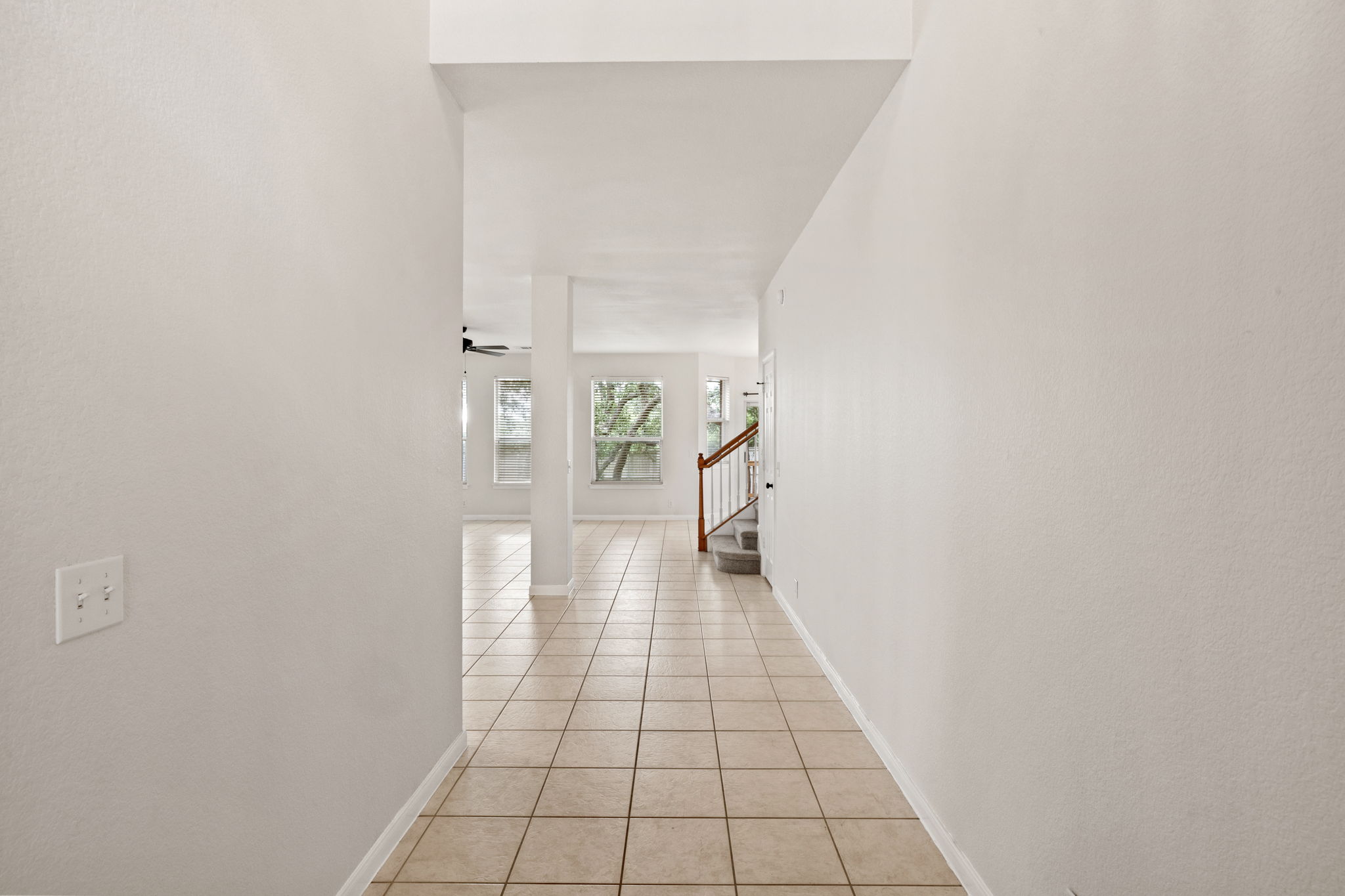 2732 Cascade Falls Drive Austin, TX 78738 - Photo 4 of 40 a hallway with a white walls