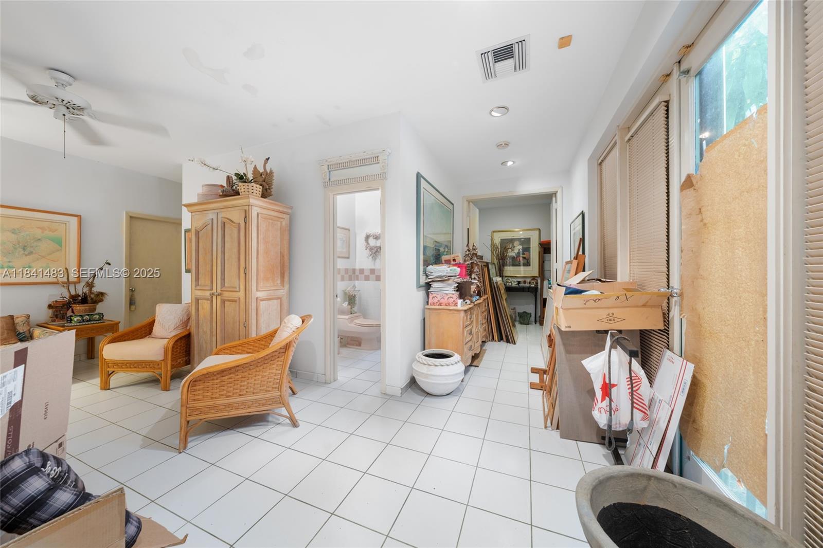 6002 Southwest 79th Court Miami, FL 33143 - Photo 24 of 47 a living room with furniture and wooden floor
