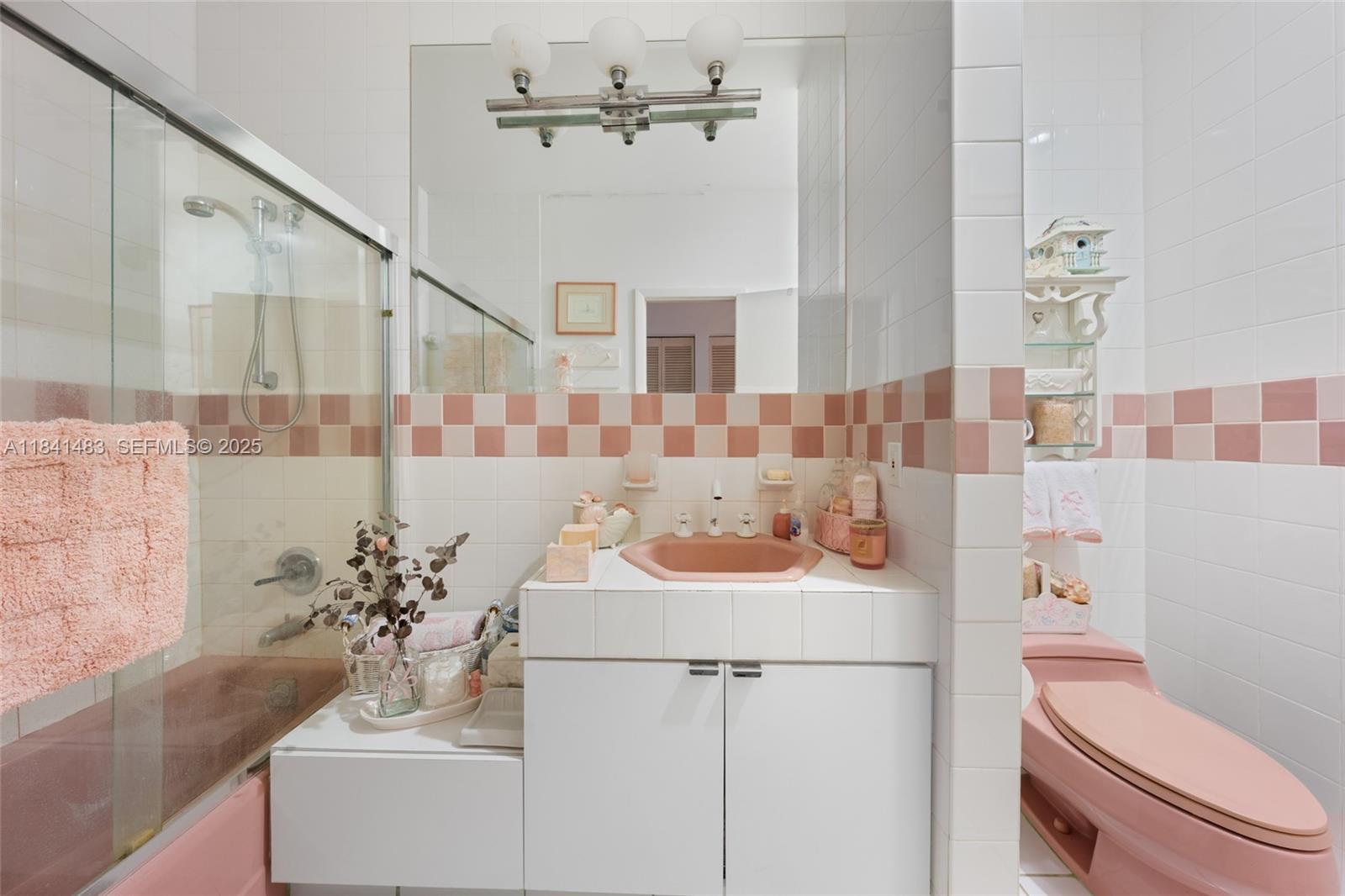 6002 Southwest 79th Court Miami, FL 33143 - Photo 25 of 47 a bathroom with a sink toilet and shower