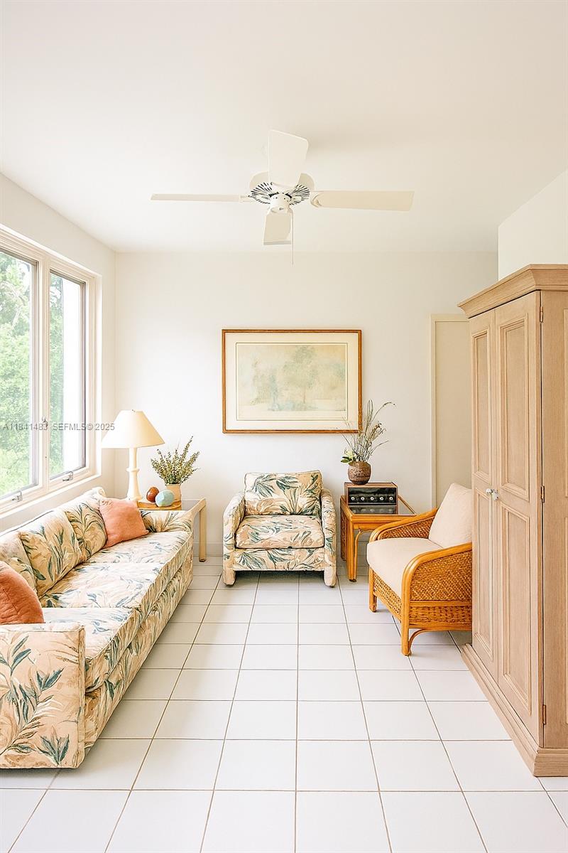 6002 Southwest 79th Court Miami, FL 33143 - Photo 41 of 47 a bedroom with furniture and a large window