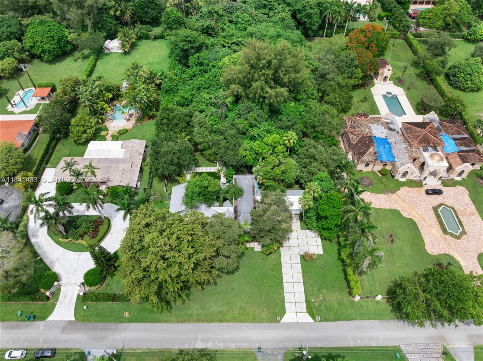 6002 Southwest 79th Court Miami, FL 33143 - Photo 47 of 47 an aerial view of a house with lots of trees